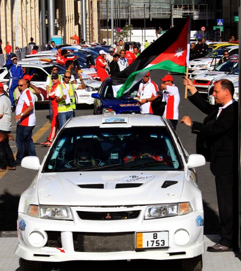 HRH Prince Feisal Al-Hussein flags Suhail Al-Jariri and Maysoon Jayousi from the start of the 2014 Jordan Rally..JPG