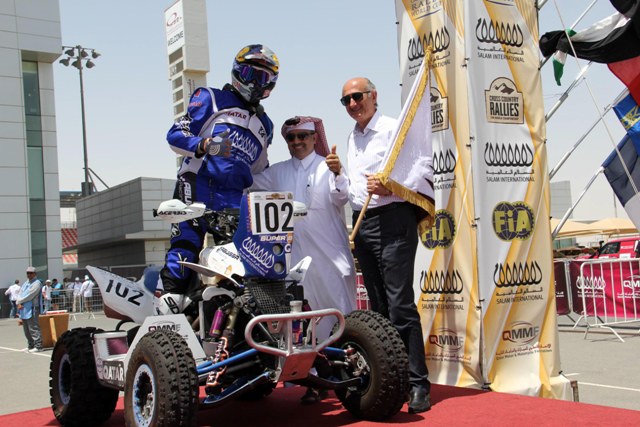 Mohammed Abu Issa of Qatar is flagged away from the start of the Sealine Rally at Losail..jpg